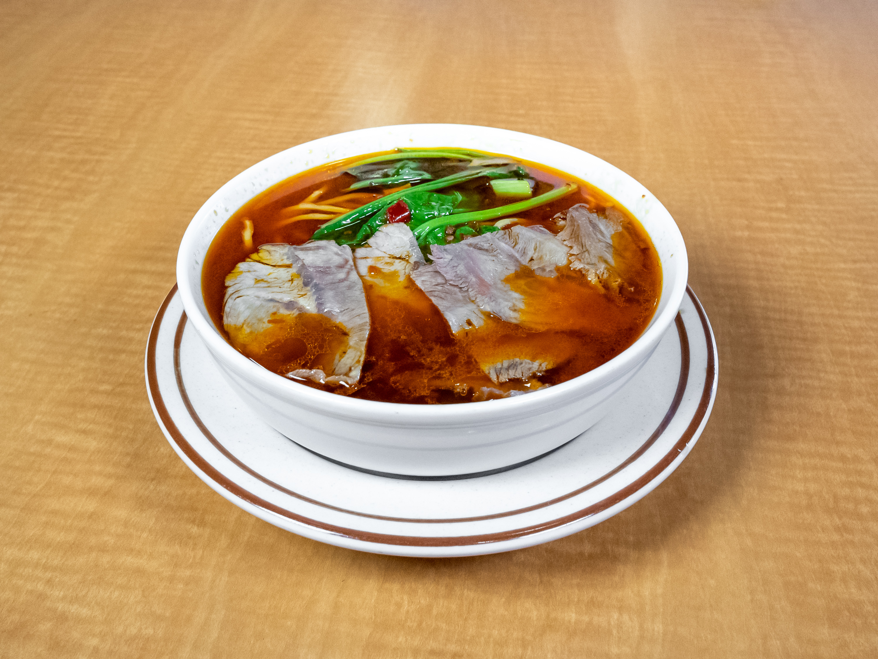 Order Spicy Beef Noodle Soup food online from Szechuan Cuisine store, Glendale on bringmethat.com