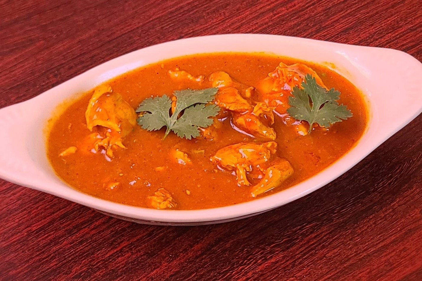 Order Chicken Curry food online from Om Indian Cuisine store, San Francisco on bringmethat.com