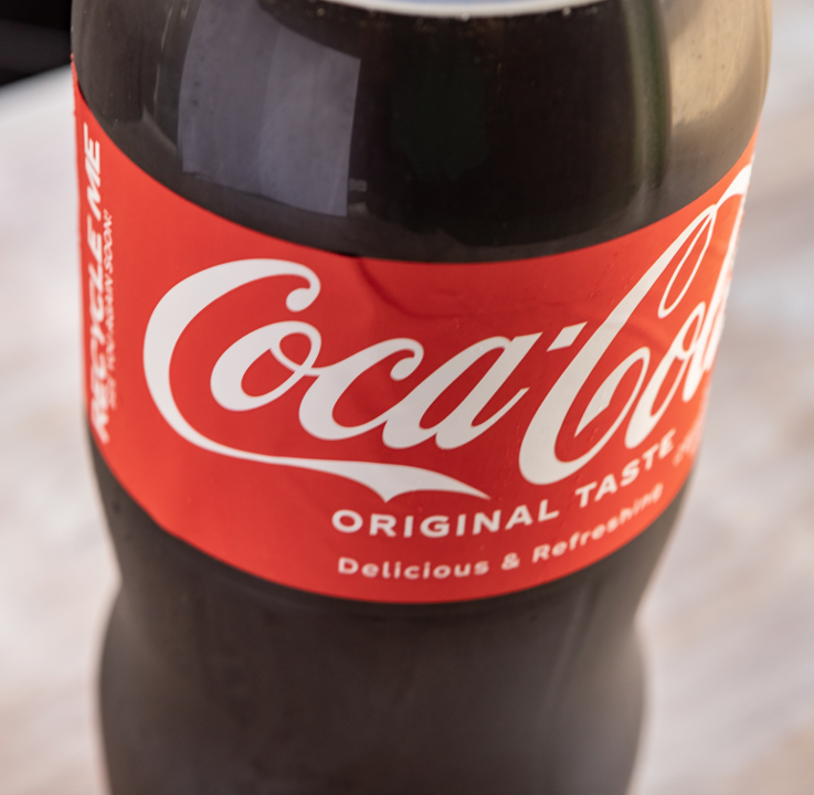 Order 2Liter Coke food online from Head West Subs store, Springfield on bringmethat.com
