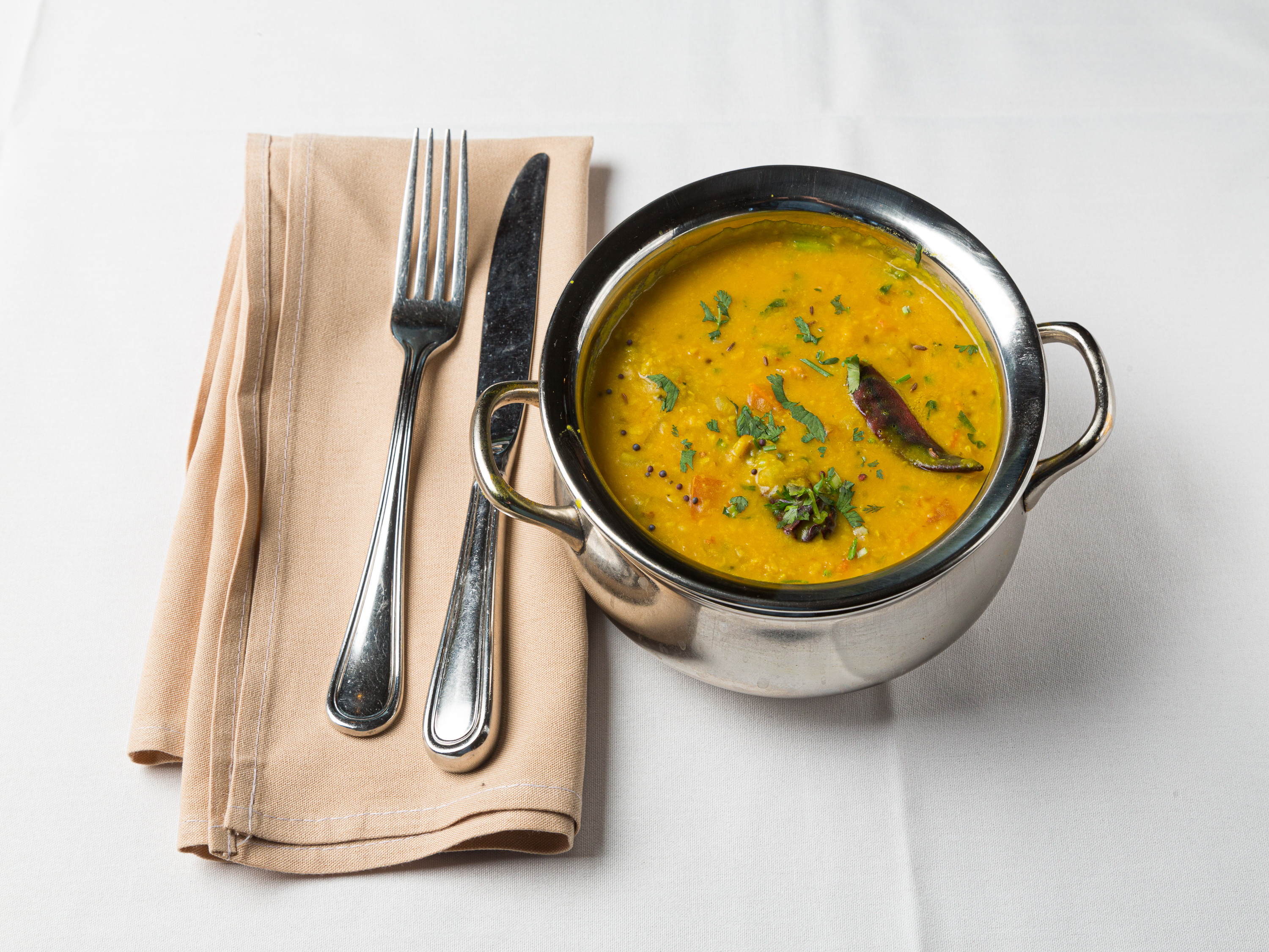 Order Dal Tadka food online from Downtown Dhaba Inc store, Westwood on bringmethat.com