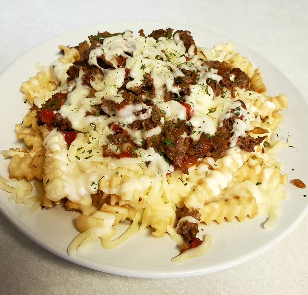 Order Philly Cheesesteak Fries  food online from The Caddyshack store, Petersburg on bringmethat.com