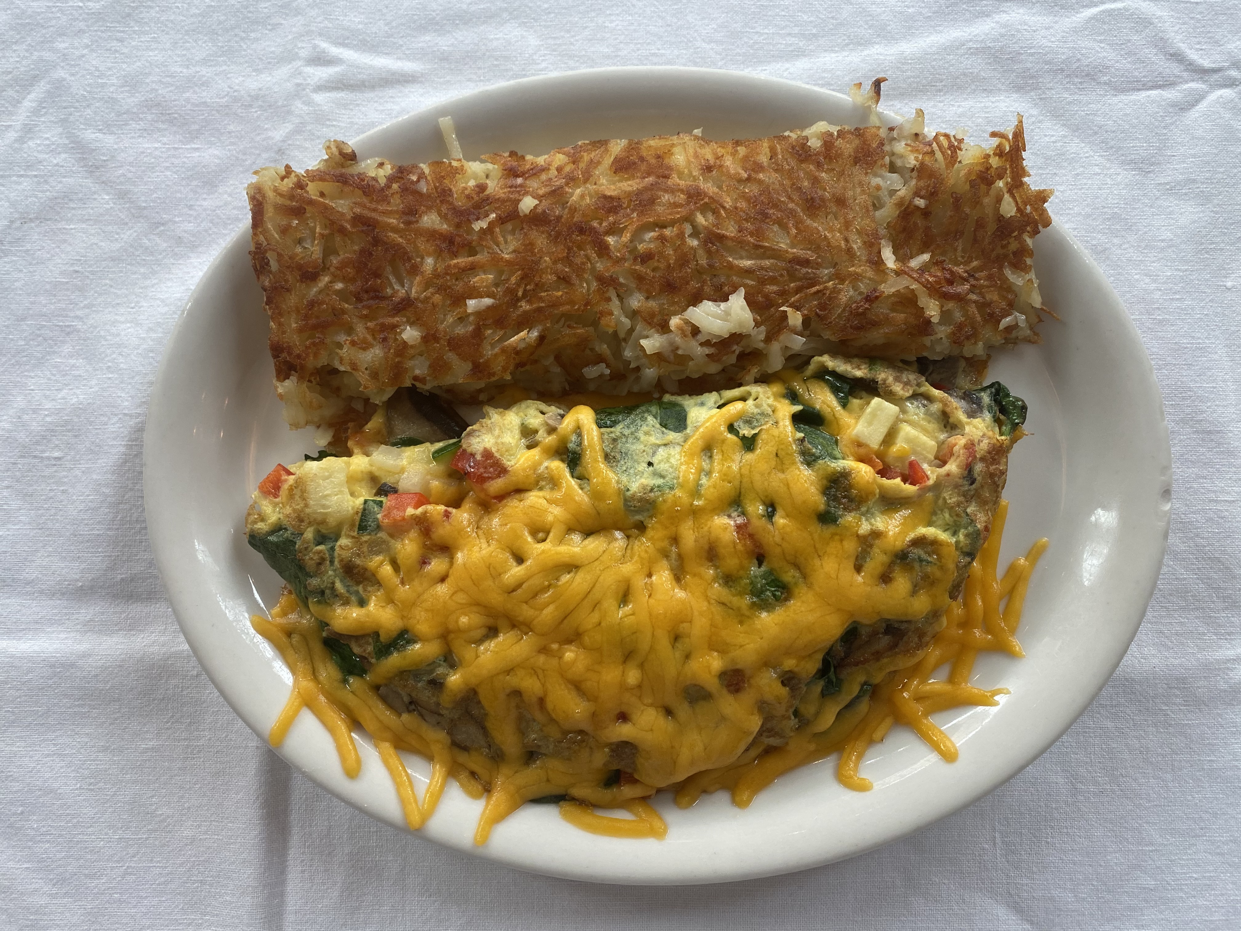 Order Vegetable & Cheese Omelet food online from Russell's Burgers store, Pasadena on bringmethat.com