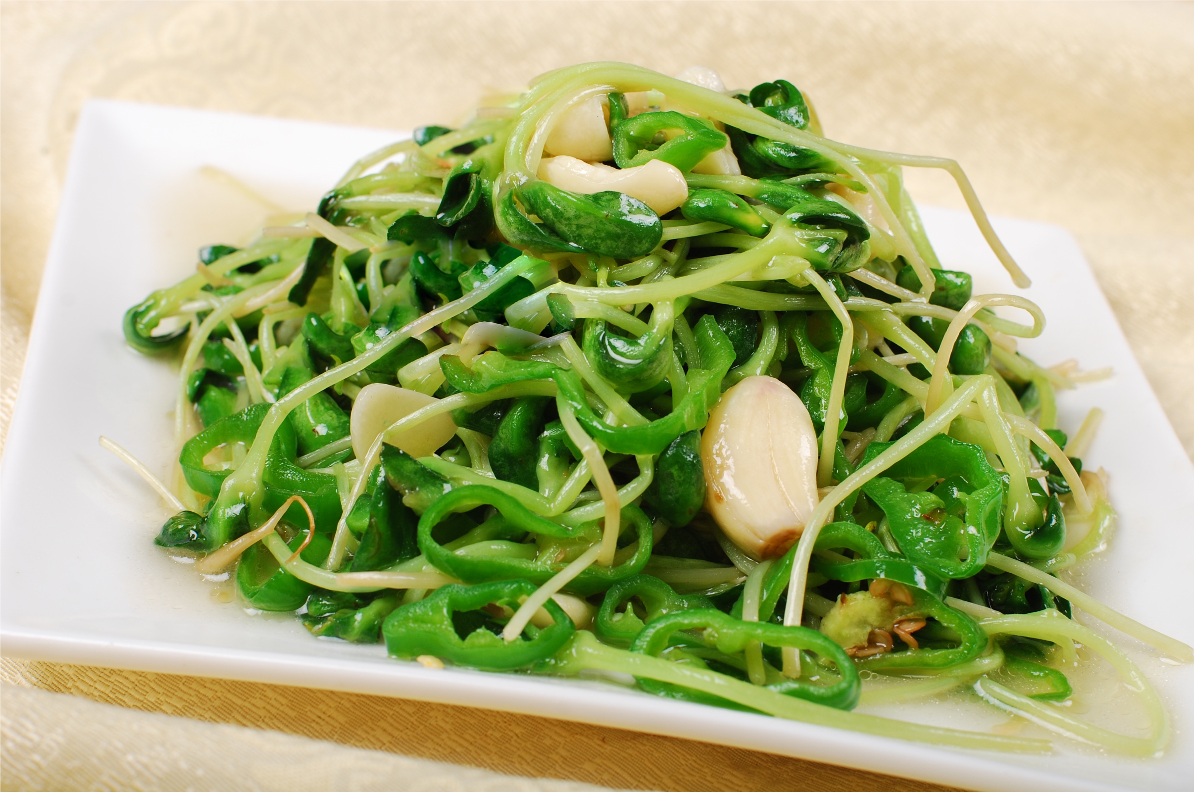 Order 16. Sauteed Pea Shoots food online from Grand sichuan eastern store, New York on bringmethat.com