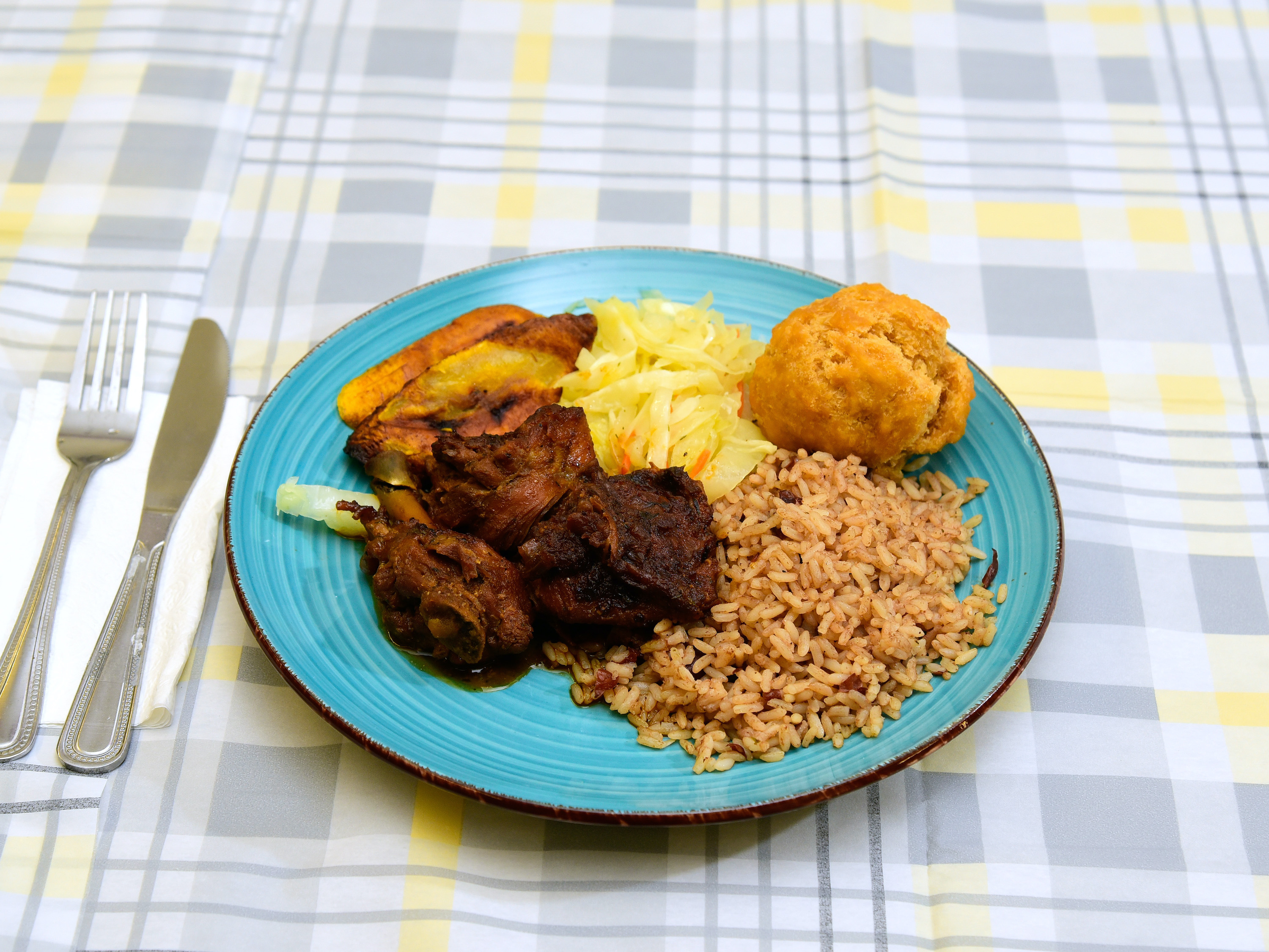 Order Brown Stew Chicken food online from Yaad Style Jamaican Restaurant store, Rochester on bringmethat.com