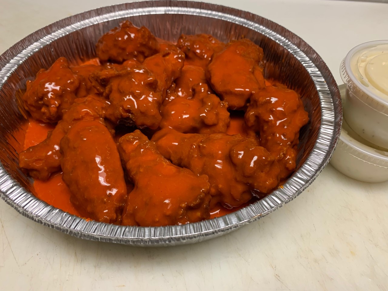 Order 8 Piece Wings food online from Nancy Pizza store, Niles on bringmethat.com