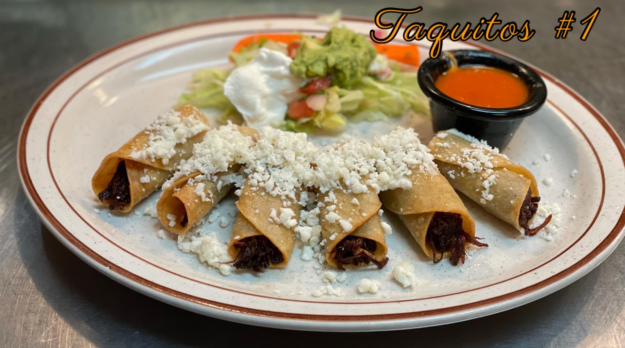 Order 1 Taquitos Dorados Lunch food online from Jacky's Restaurant store, Sioux Falls on bringmethat.com