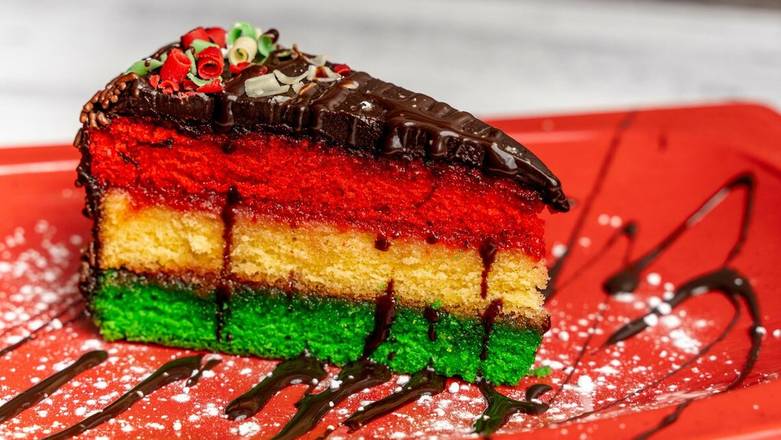 Order NY Rainbow Cake food online from Tomasino Pizza store, Winter Springs on bringmethat.com