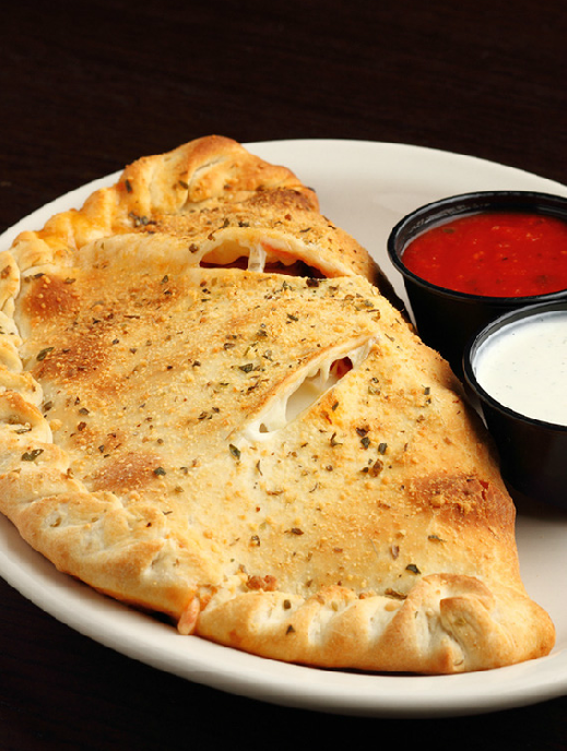 Order Calzone food online from Georgio Chicago Pizza & Pub store, Crystal Lake on bringmethat.com