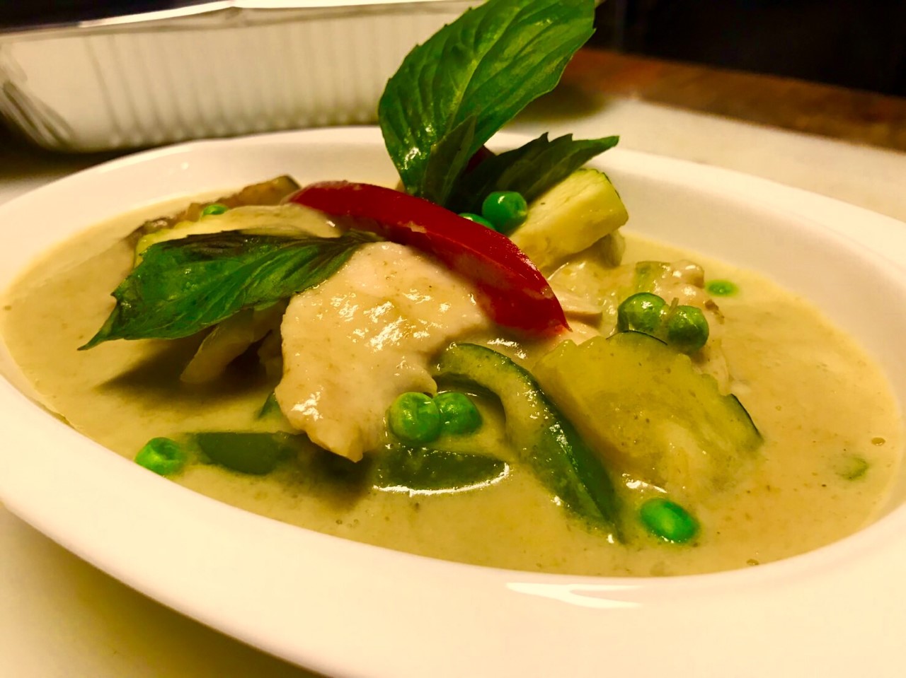 Order Green Curry food online from The Patio Fine Thai Cuisine store, Seattle on bringmethat.com