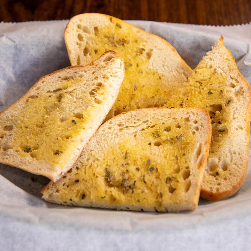 Order Homemade Garlic Bread food online from Rico Pizzeria store, Englewood on bringmethat.com