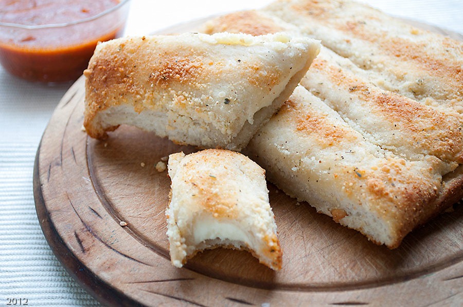 Order Stuffed Cheese Sticks food online from Pizza Rino's store, Chicago on bringmethat.com