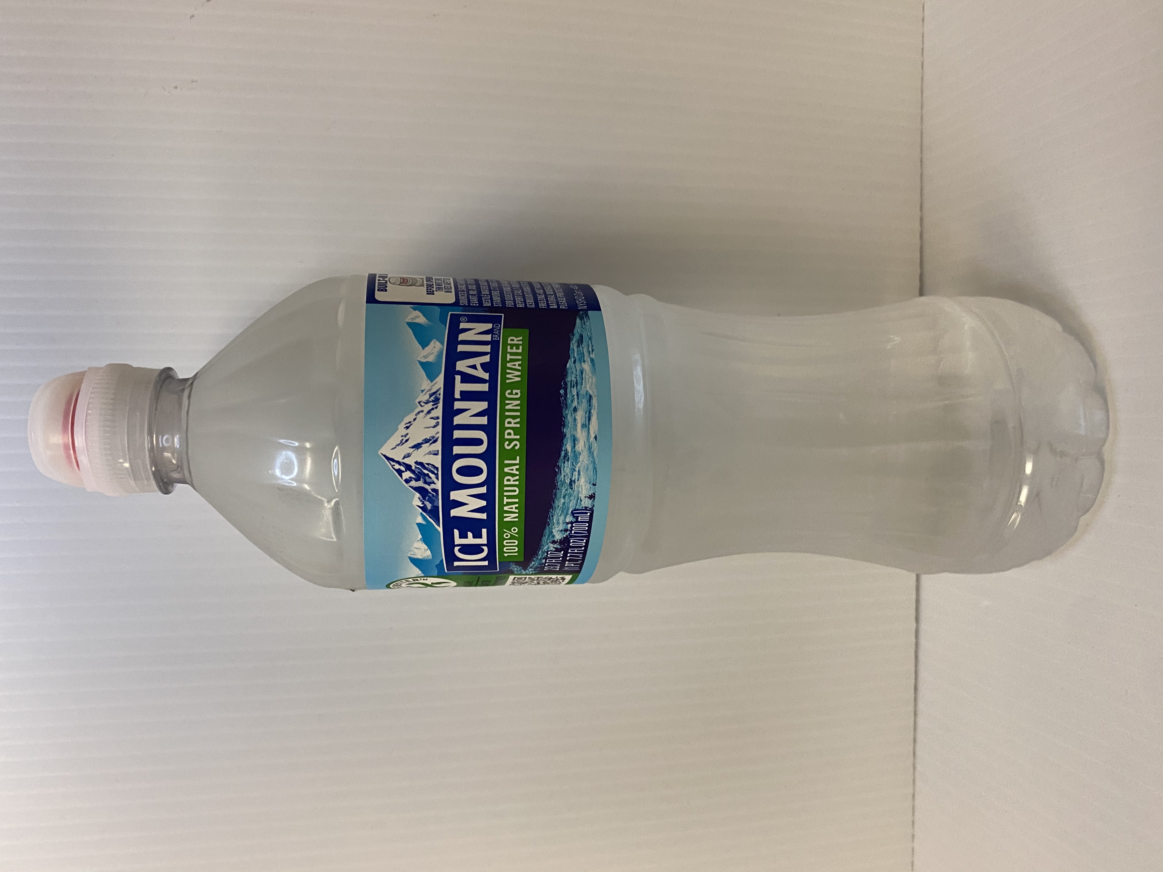 Order 23.7 oz. Ice Mountain Water food online from Just Dash It store, Englewood on bringmethat.com