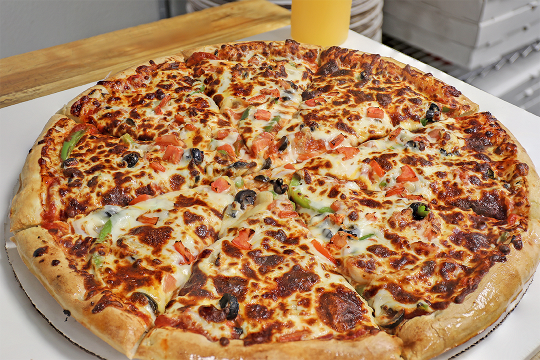 Order Veggie Pizza food online from The Depot Express store, Montezuma on bringmethat.com