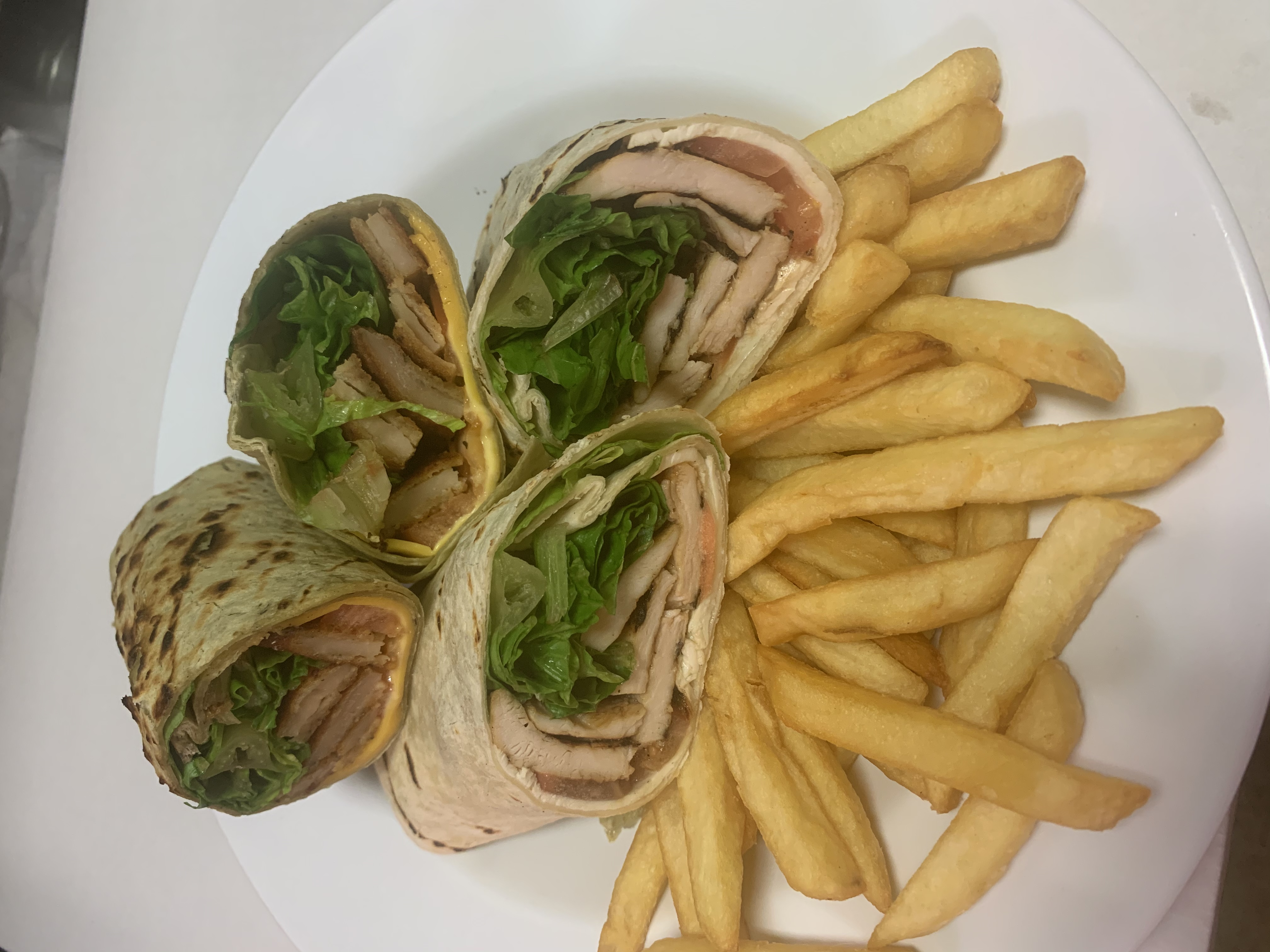 Order Crispy Chicken and Cheese Wrap food online from Taste of italy store, Corona on bringmethat.com