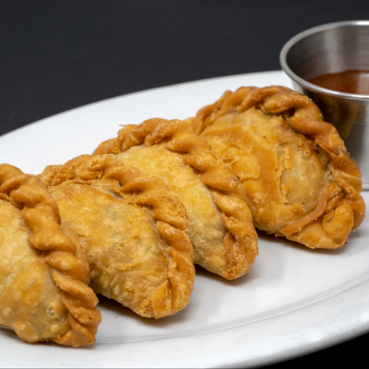 Order Curry Puffs food online from Chabaa Thai Cuisine store, San Francisco on bringmethat.com