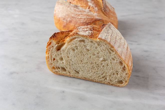 Order Sourdough Batard food online from Porto's Bakery & Cafe store, Downey on bringmethat.com
