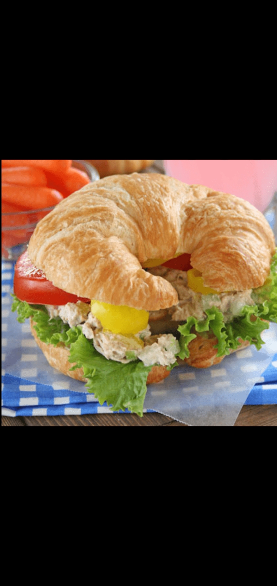 Order  Classic Tuna Salad With Tomatoes Romaine Lettuce  Pickles Gourmet Croissant Sandwich  food online from American Gourmet Foods Deli store, New York on bringmethat.com
