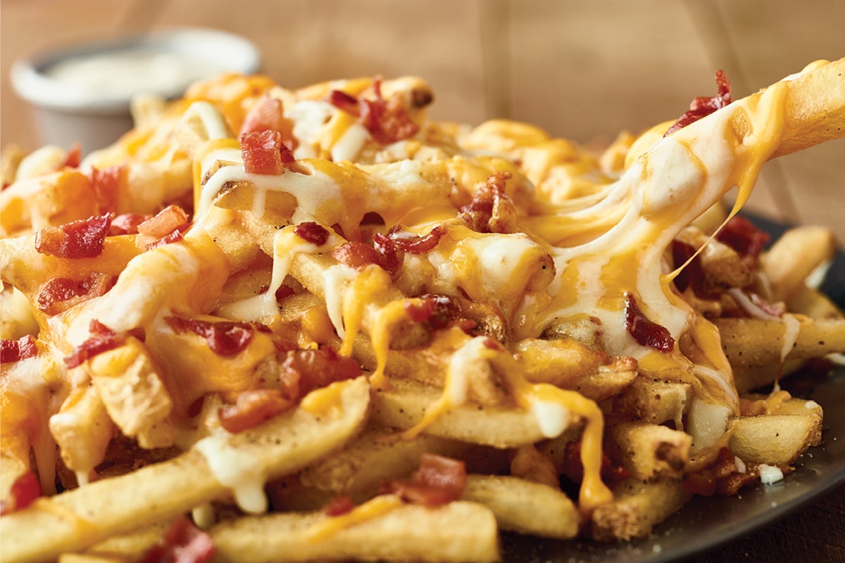 Order Aussie Cheese Fries food online from Outback Steakhouse store, Cincinnati on bringmethat.com