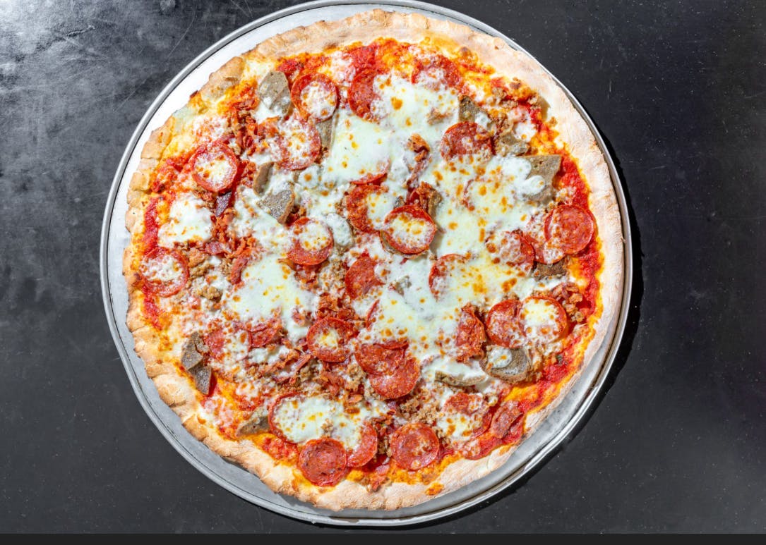 Order Stuffed Meat Pizza - Medium food online from Little Italy Brick Oven store, Washington on bringmethat.com