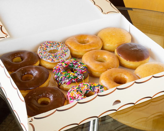 Order Bakers Choice Assorted Dozen Doughnuts food online from Momma's Donuts store, White Settlement on bringmethat.com