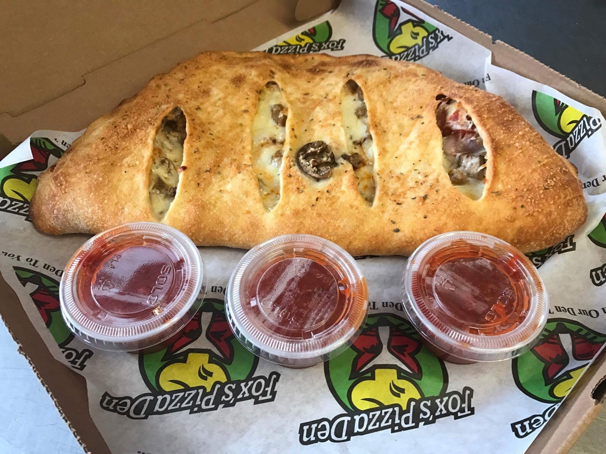 Order The Works Stromboli - Small 9'' food online from Fox's Pizza Den store, Parkhill on bringmethat.com