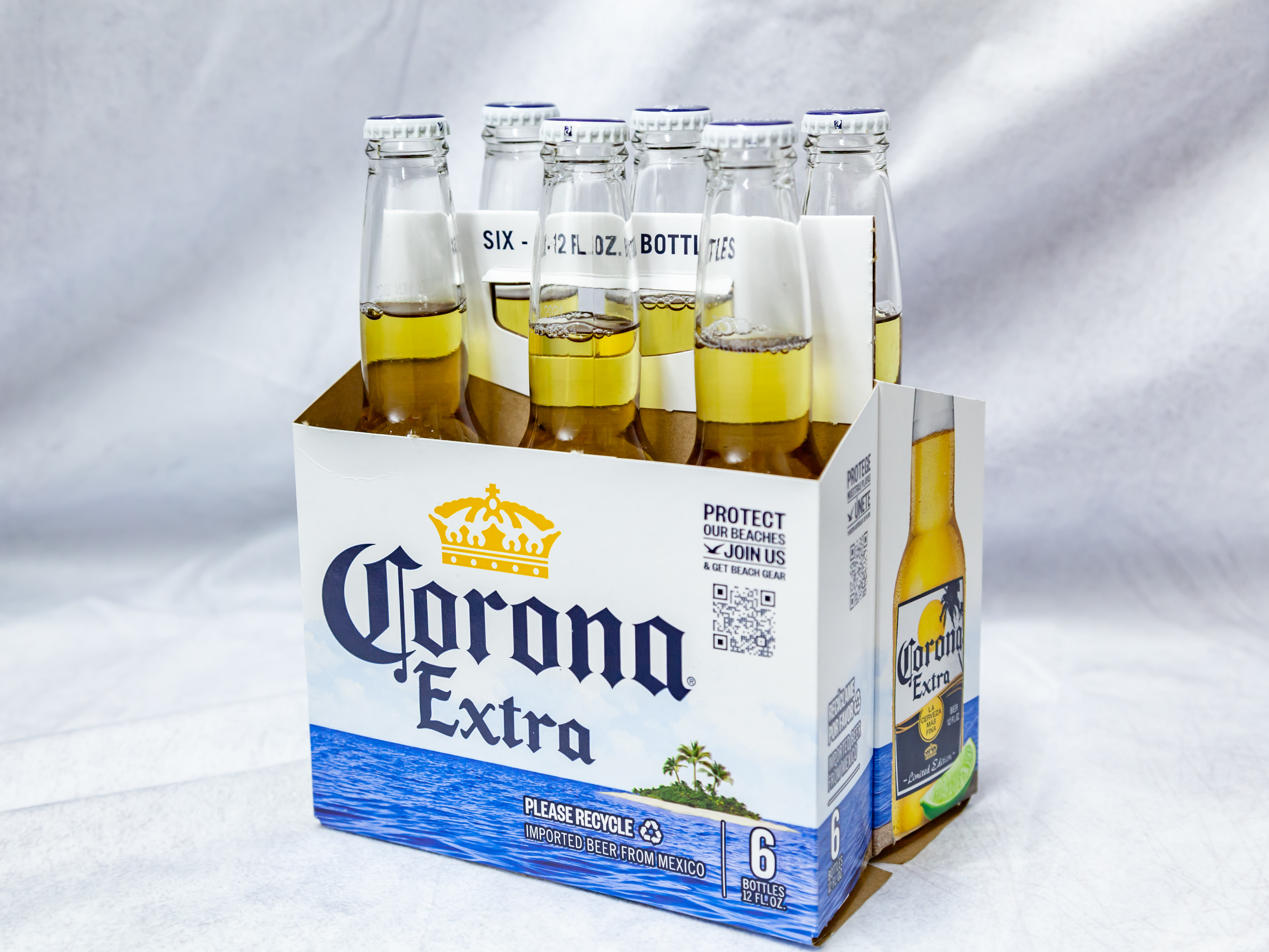 Order 24oz. Can Corona Extra  food online from Gallaghers Drive-In Liquor store, Oakland on bringmethat.com