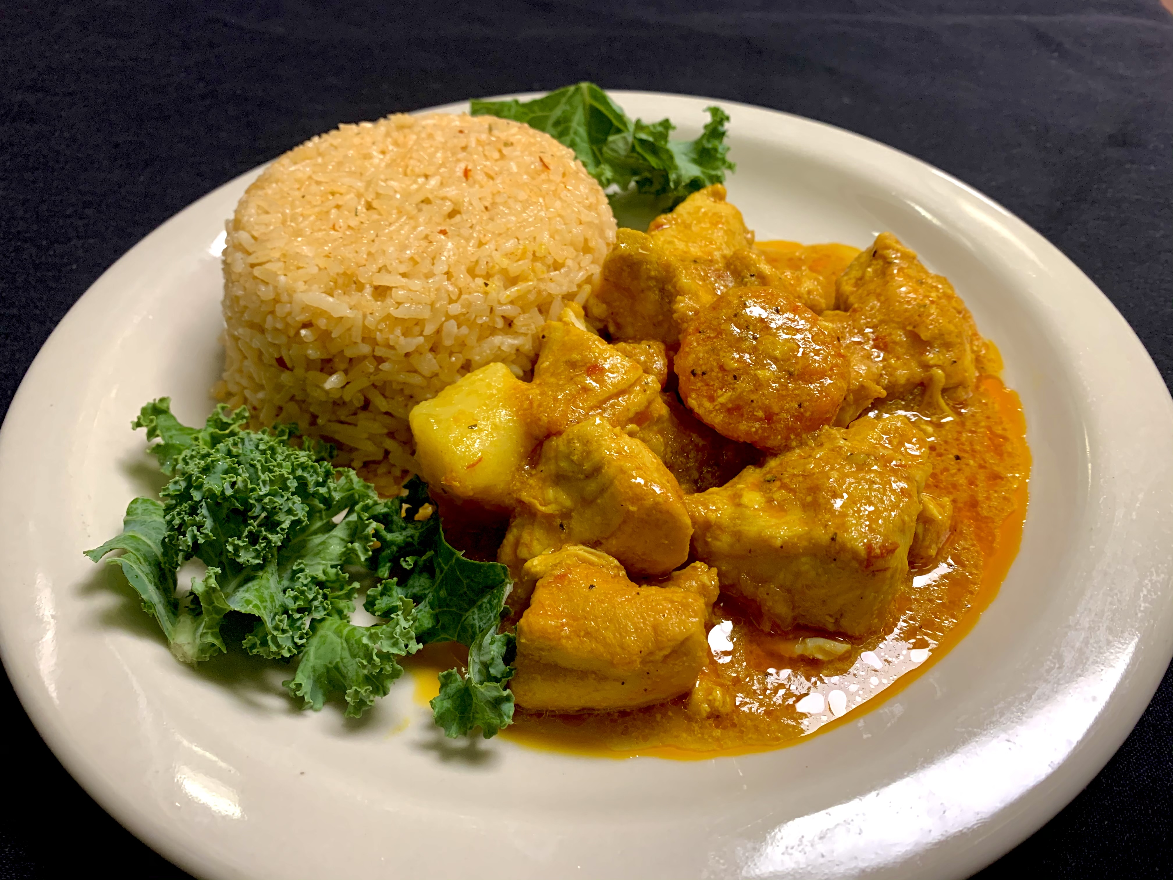 Order Chicken Curry food online from Stango Cuisine store, Urbana on bringmethat.com