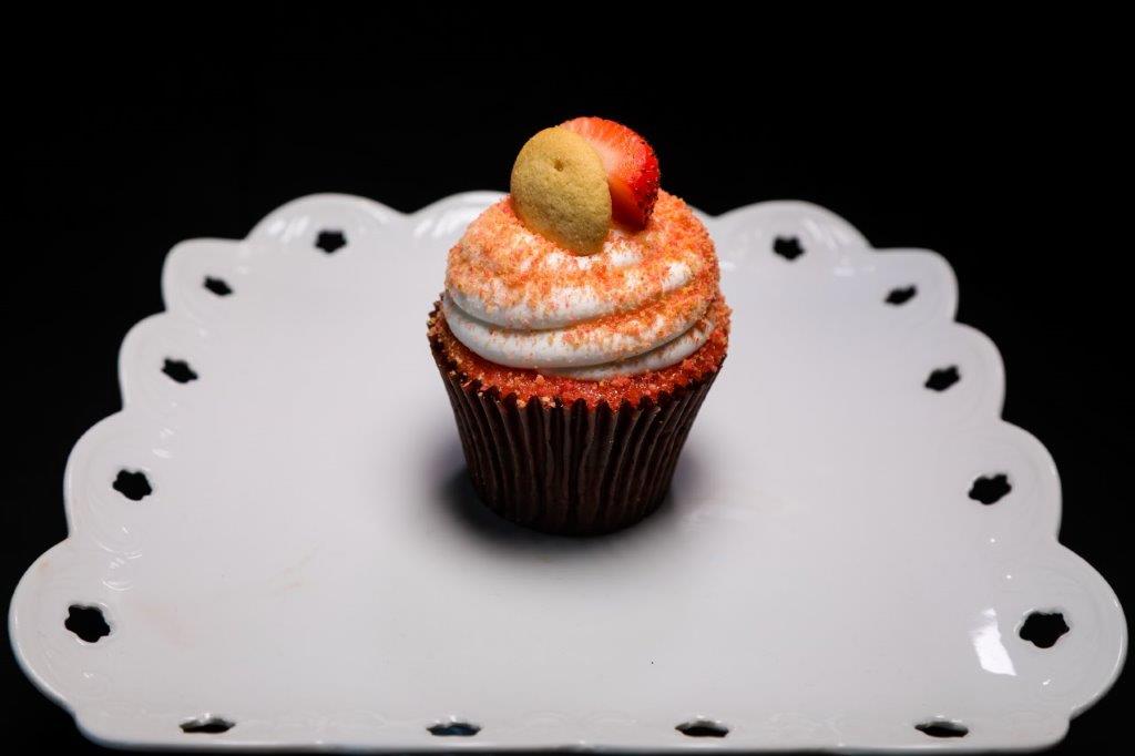 Order Strawberry Crunch Cupcake food online from Sugar Rush Too store, Houston on bringmethat.com