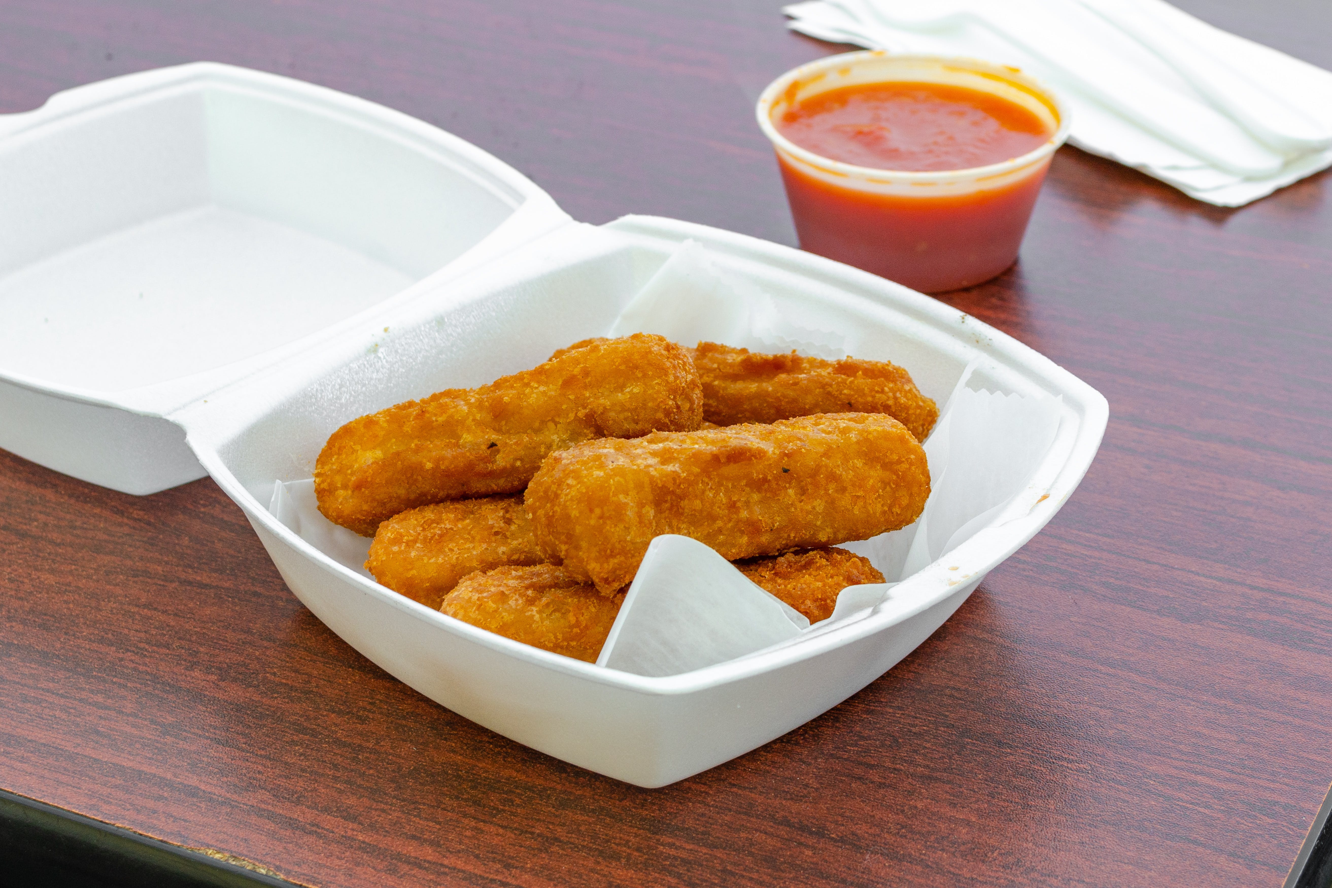 Order Mozzarella Sticks - Appetizers food online from Pronto Pizza store, Oradell on bringmethat.com