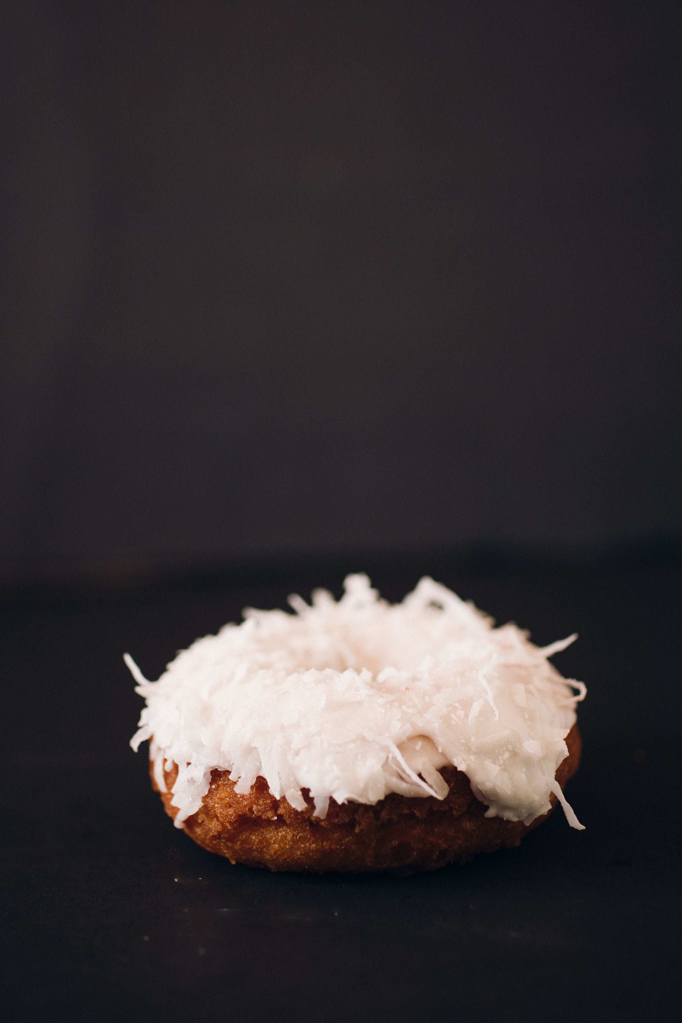 Order Vanilla coconut cake food online from Big Jim Donuts store, Glendale on bringmethat.com