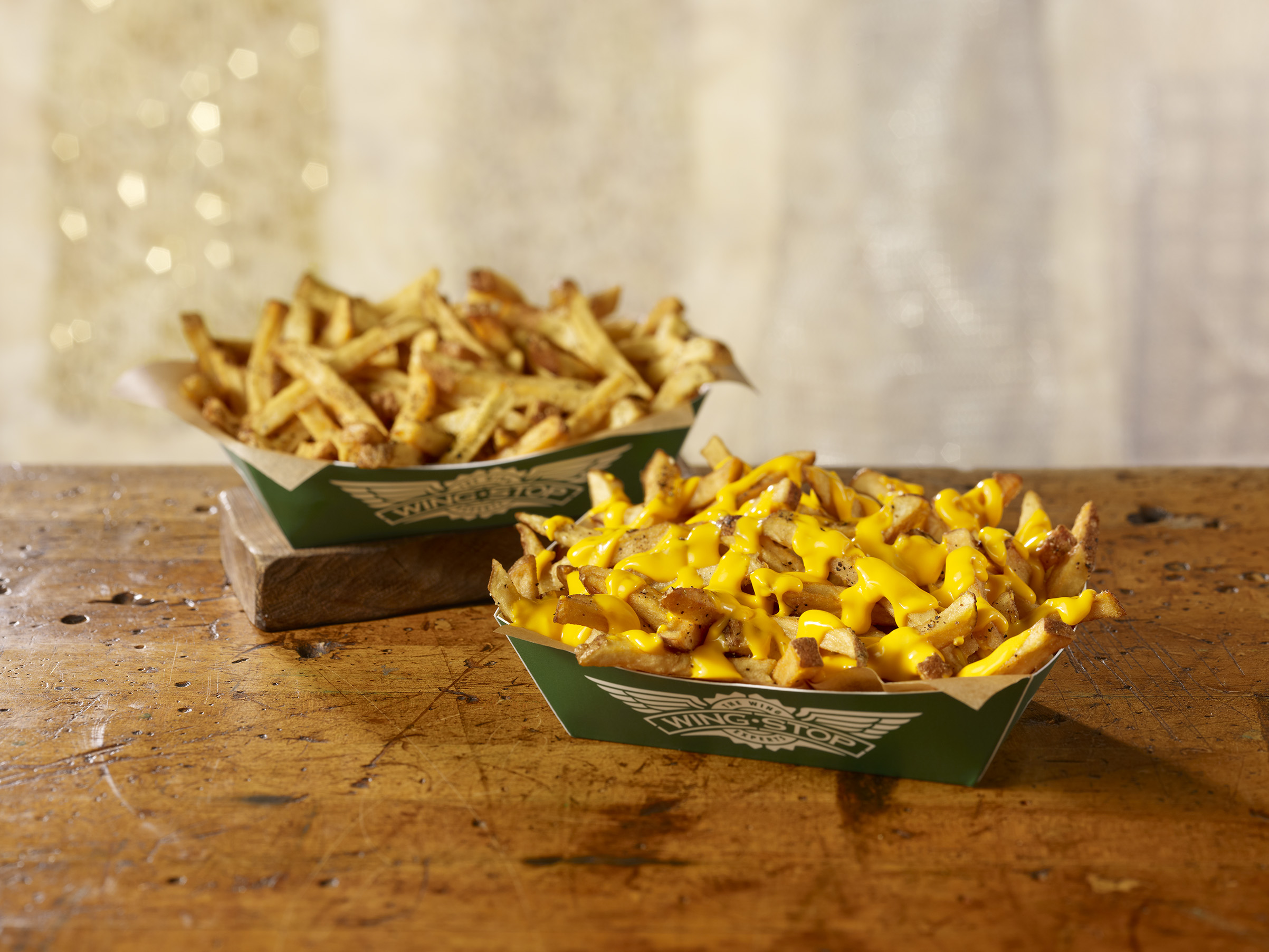 Order Cheese Fries food online from Wingstop store, Champaign on bringmethat.com
