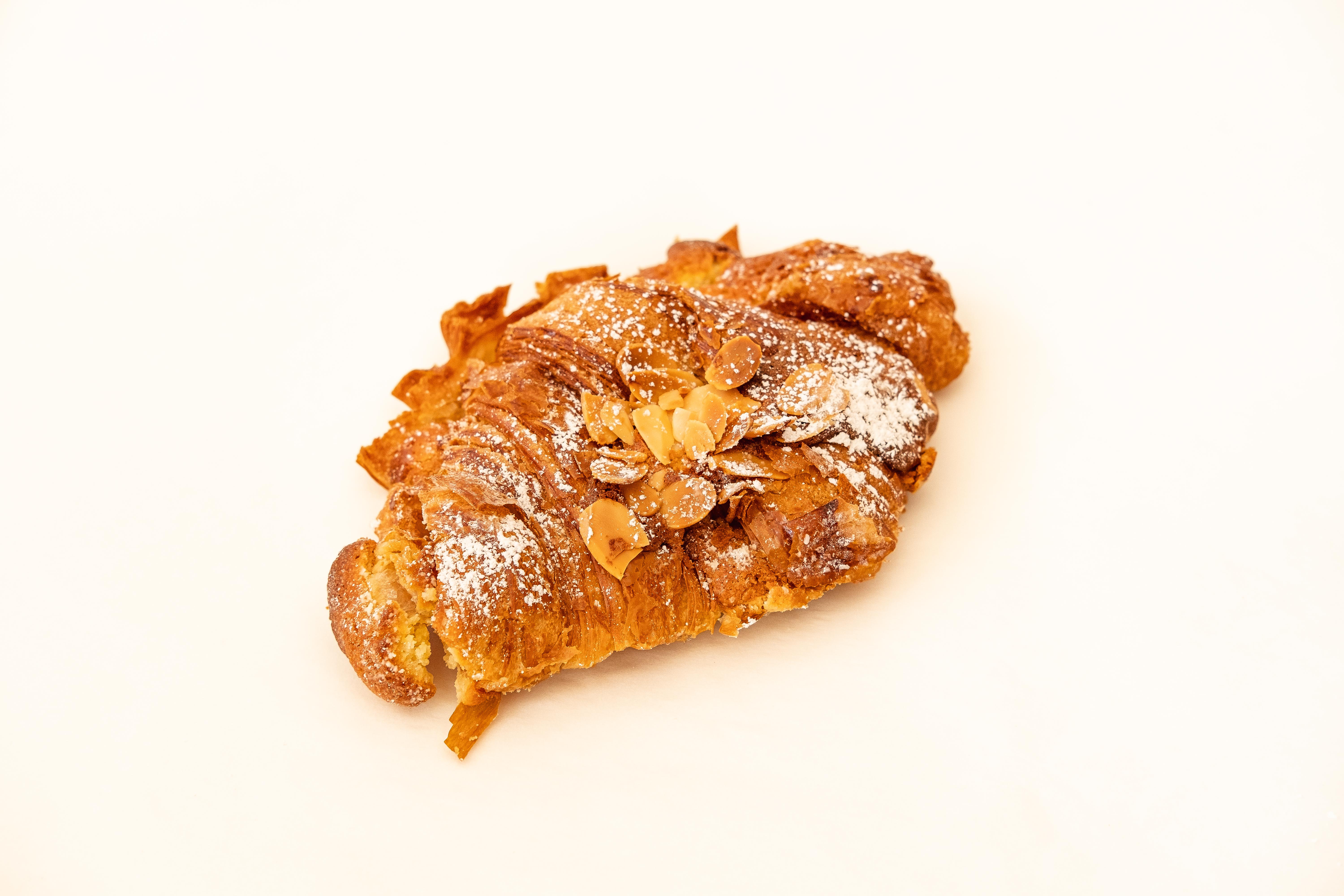 Order Almond Croissant food online from Mondo Coffee store, Beverly Hills on bringmethat.com