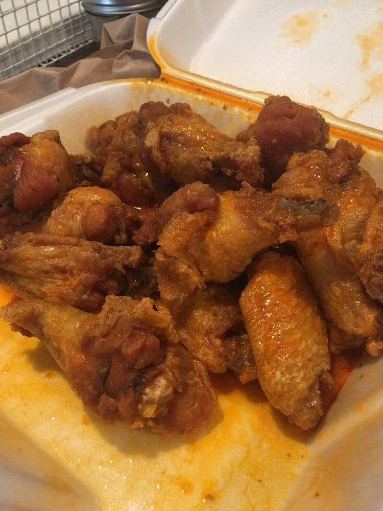Order Buffalo Style Chicken Wings - Individual (10 Pieces) food online from Pizza Connection store, Quincy on bringmethat.com