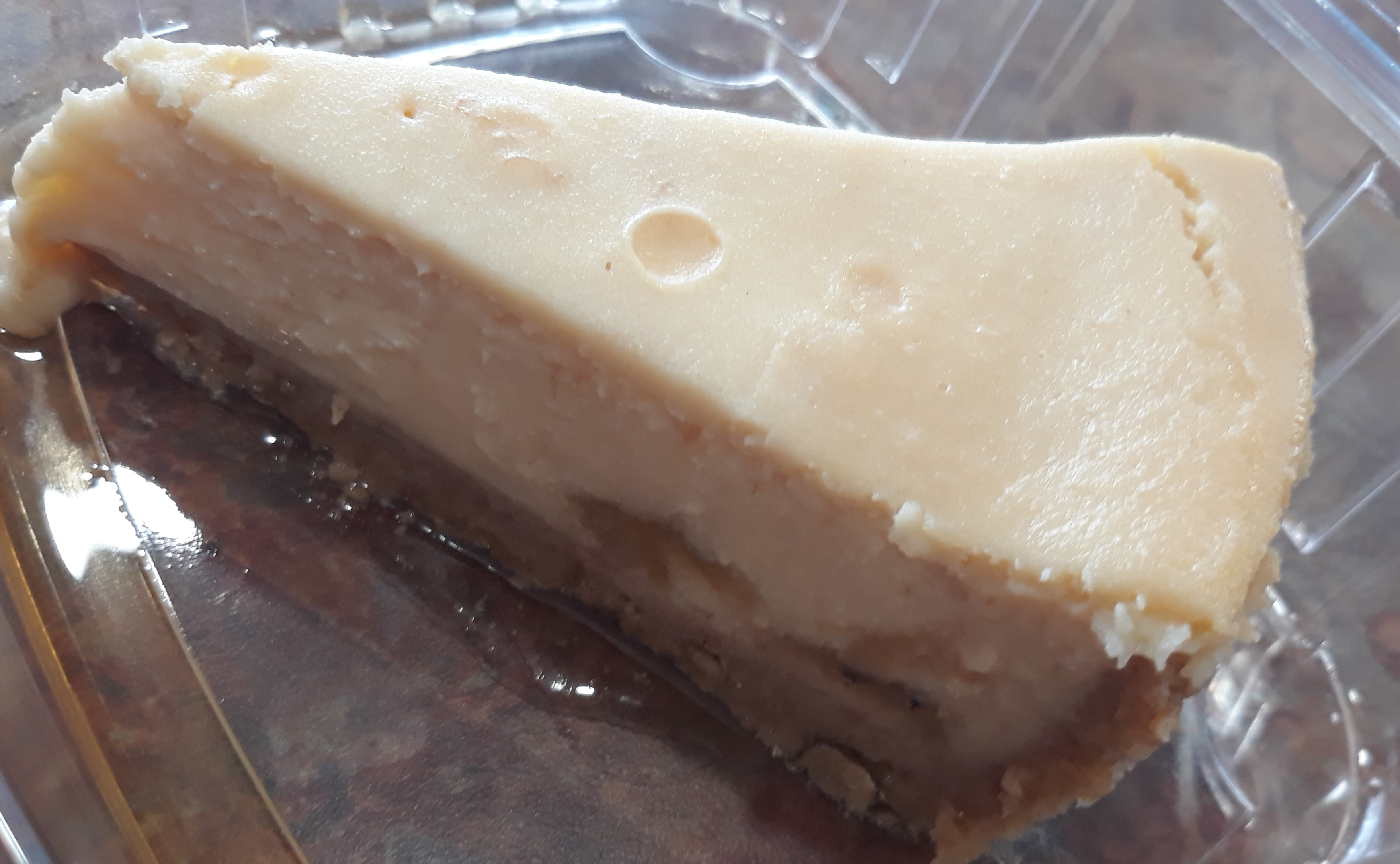 Order Banana's Foster Cheesecake food online from Spice Island Grill store, Colorado Springs on bringmethat.com