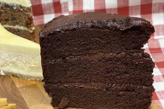 Order Chocolate Cake food online from Manny & Olga's Pizza - Wheaton store, Wheaton on bringmethat.com