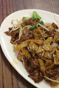 Order 77. Beef Chow Fun-干炒牛河 food online from Tasty Cafe Restaurant store, Davie on bringmethat.com