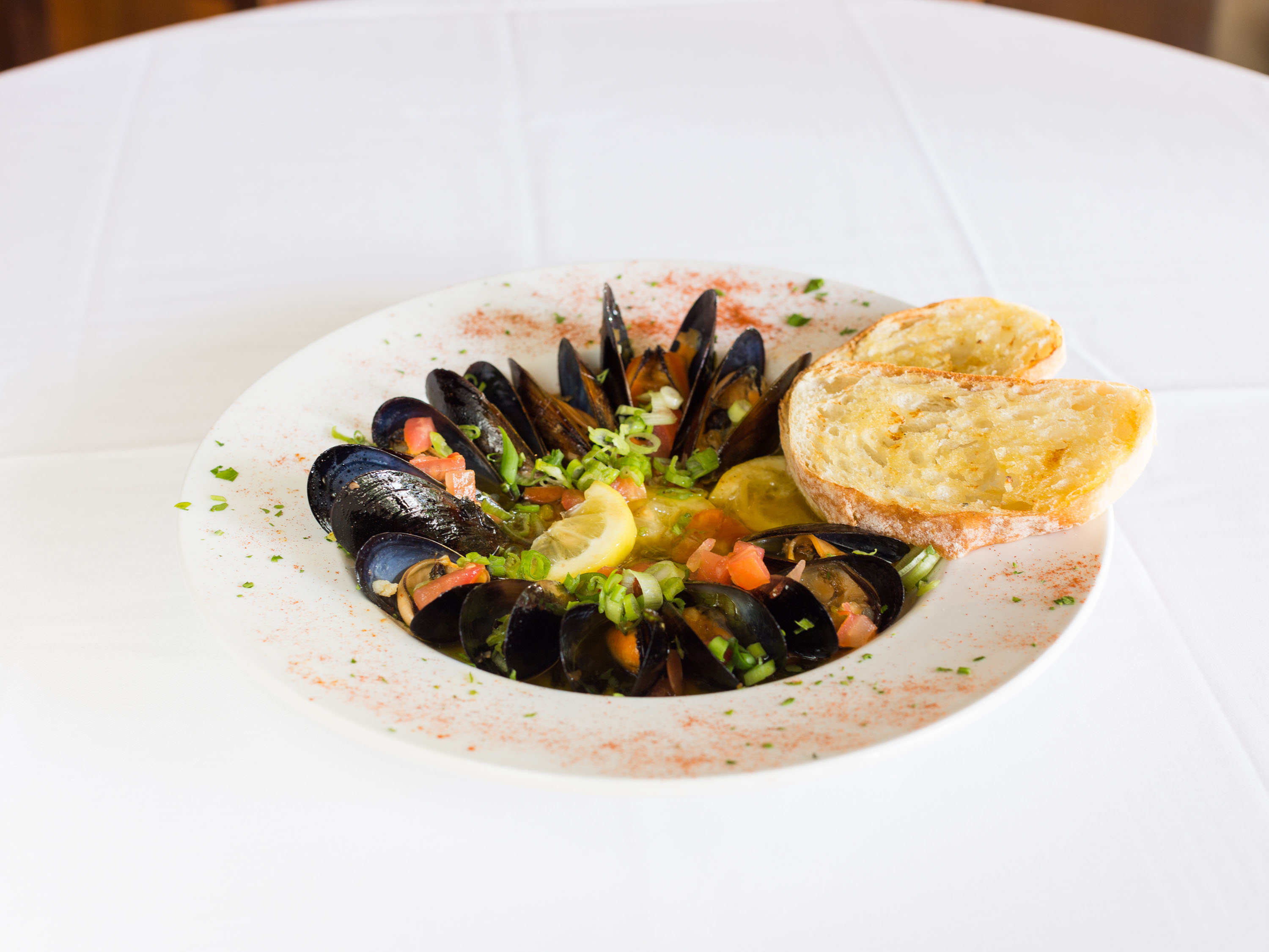 Order Mussels food online from Trio A Brick Oven Cafe store, Greenville on bringmethat.com