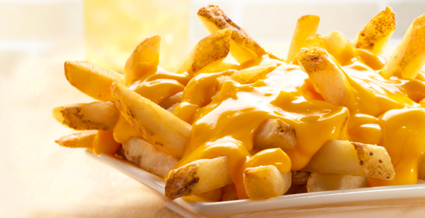 Order Cheez Whiz Fries food online from Youz Guyz South Philly Cheesesteaks store, Universal City on bringmethat.com