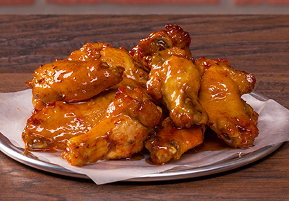 Order Classic Stingin Honey Garlic Wings food online from Mountain Mikes Pizza store, Fairfield on bringmethat.com