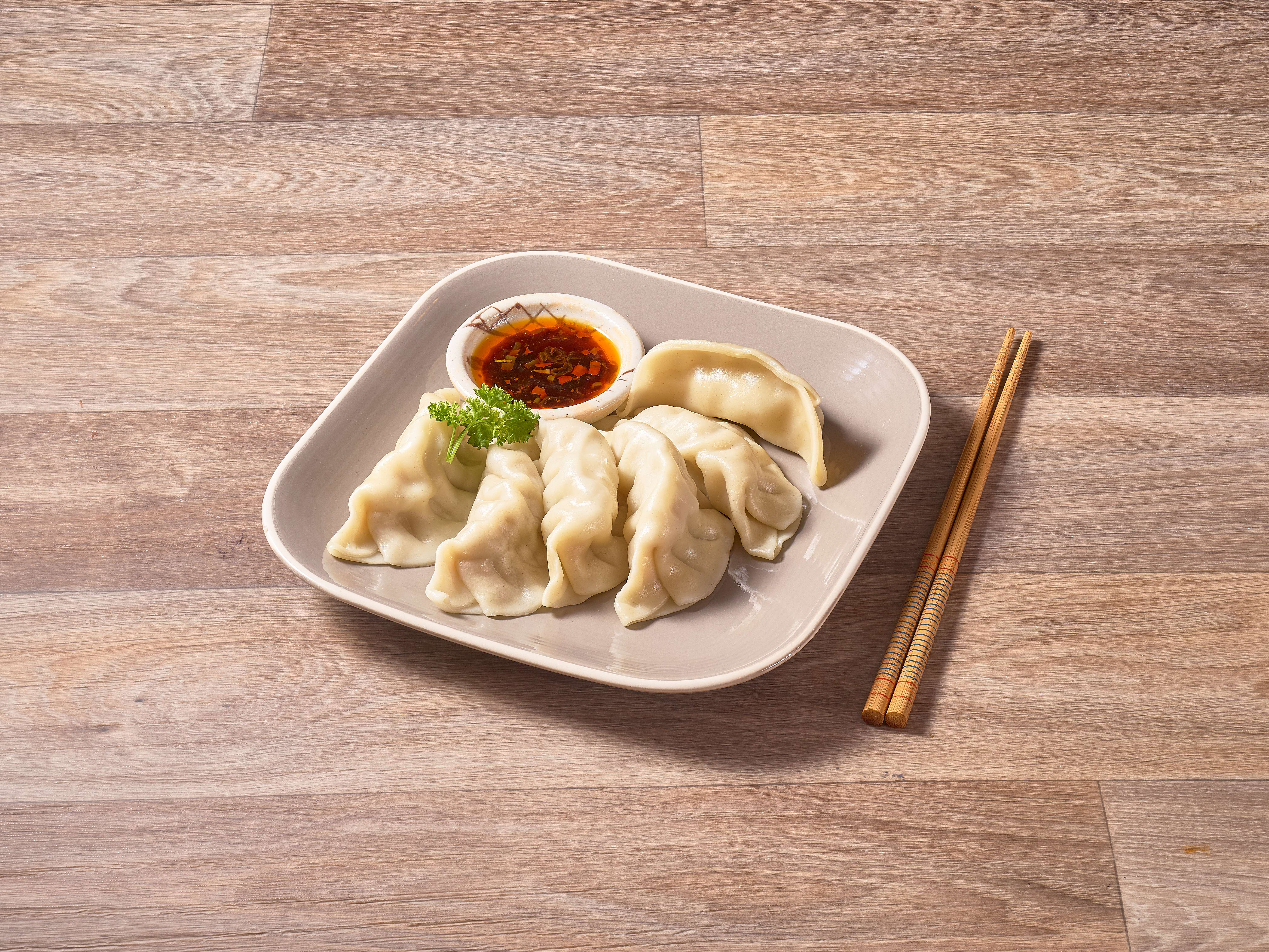 Order A4. Dumplings food online from Happy Cafe store, Denver on bringmethat.com
