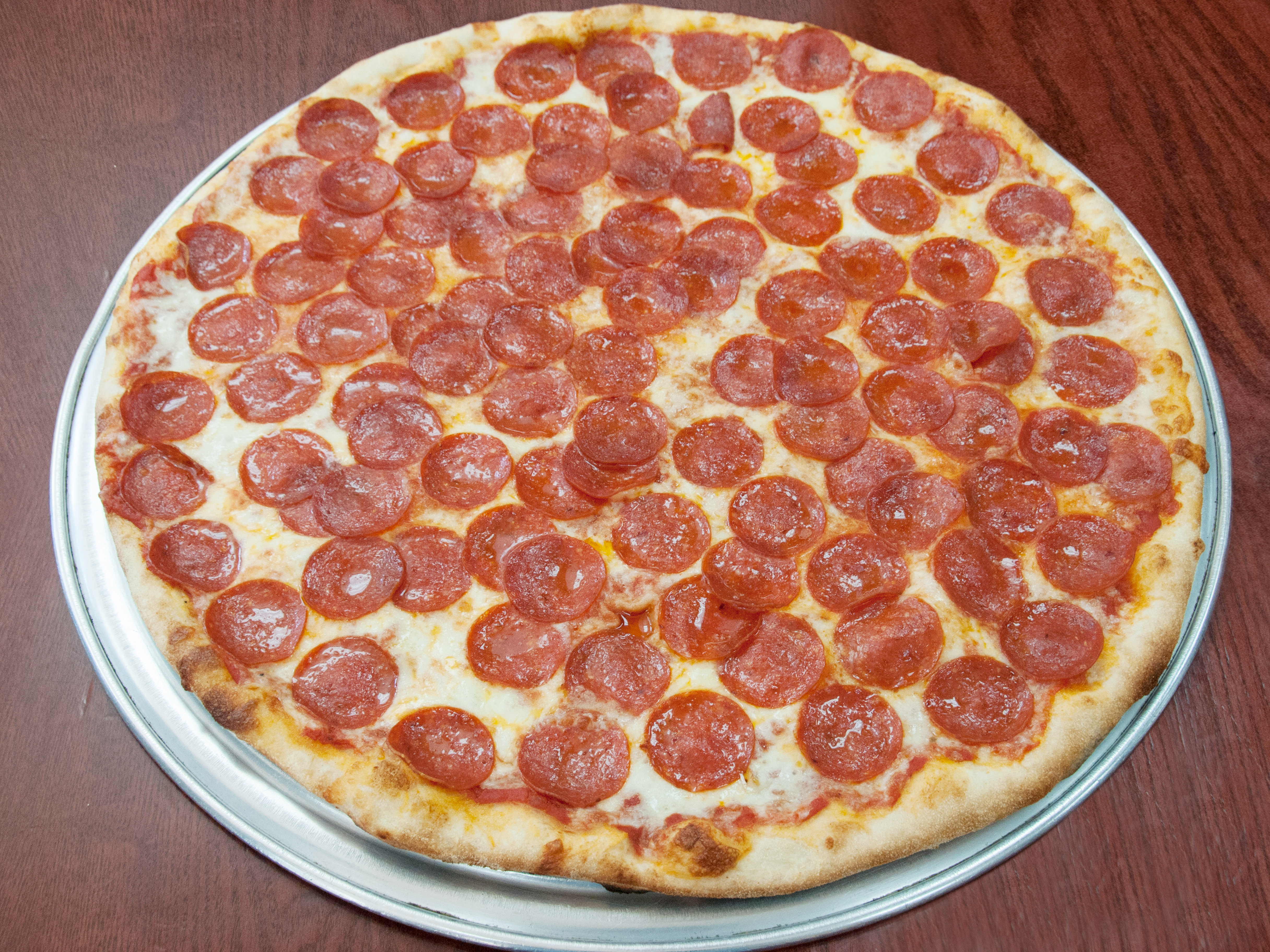 Order Pepperoni Pizza food online from Picasso Pizza store, New York on bringmethat.com