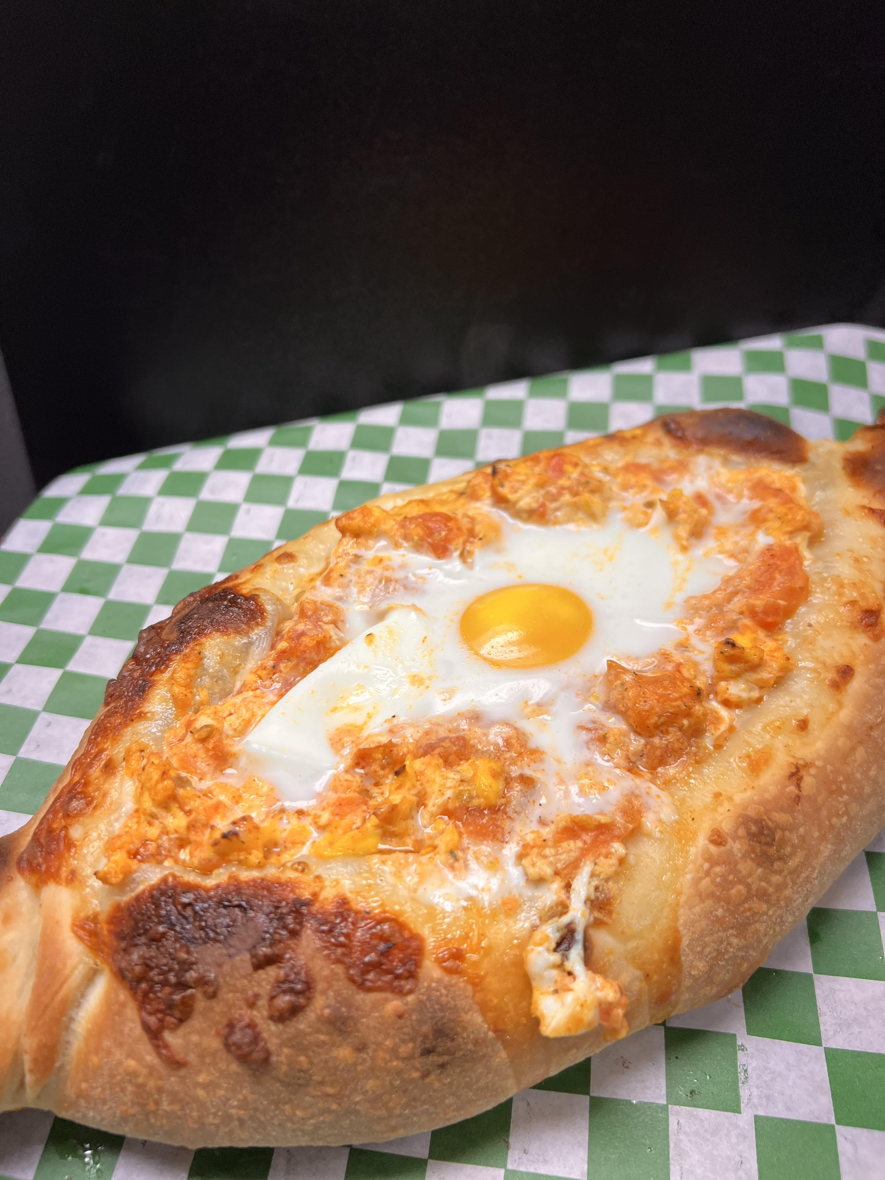 Order Ajarakan Khachapuri with Tomato Omelet food online from Ossys Bakery store, Glendale on bringmethat.com