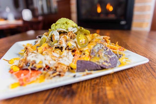 Order Chicken Nachos with Sweet Corn Relish food online from The Metropolitan store, North Wales on bringmethat.com