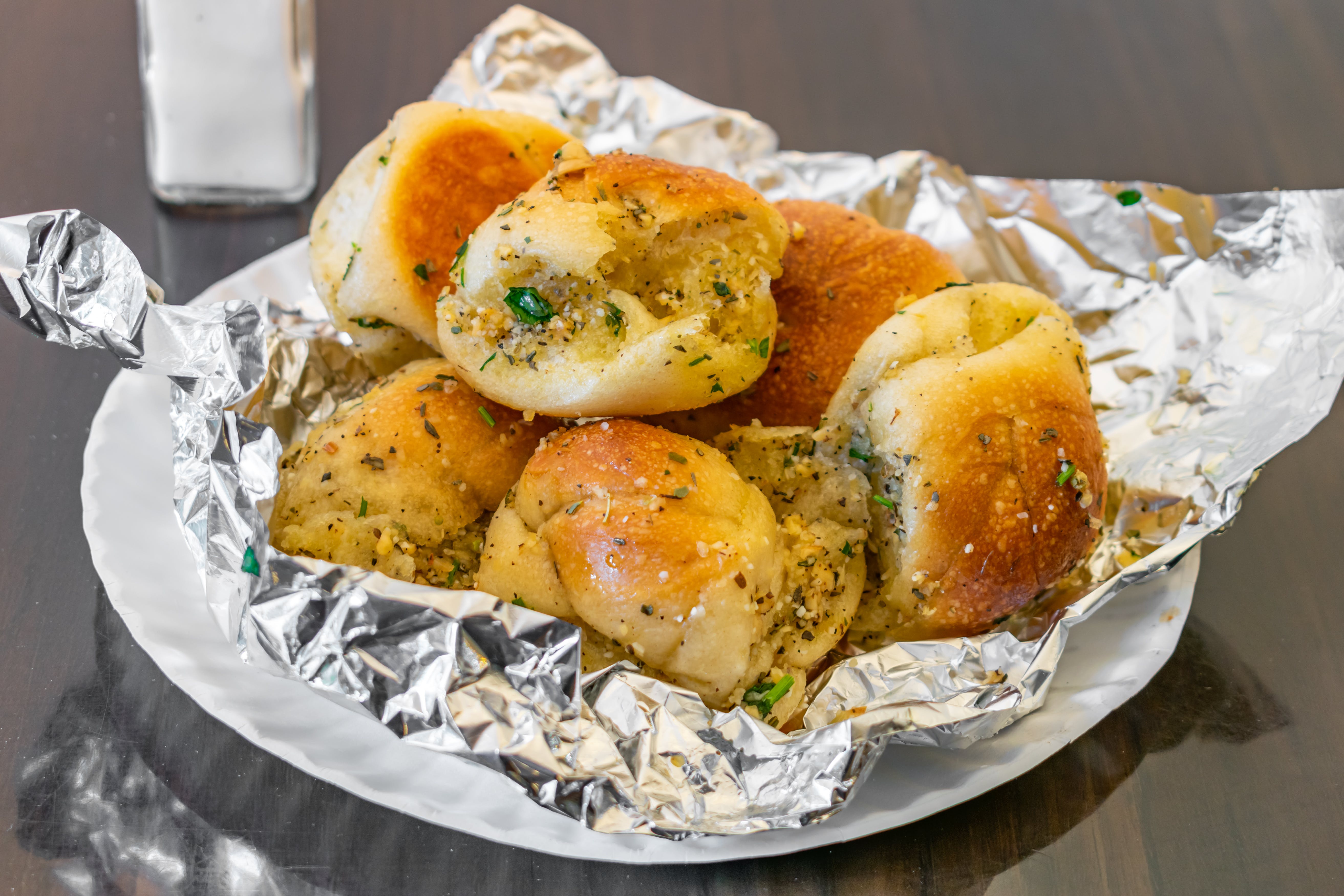 Order Garlic Knots - 6 Pieces food online from The sicilian store, Brooklyn on bringmethat.com