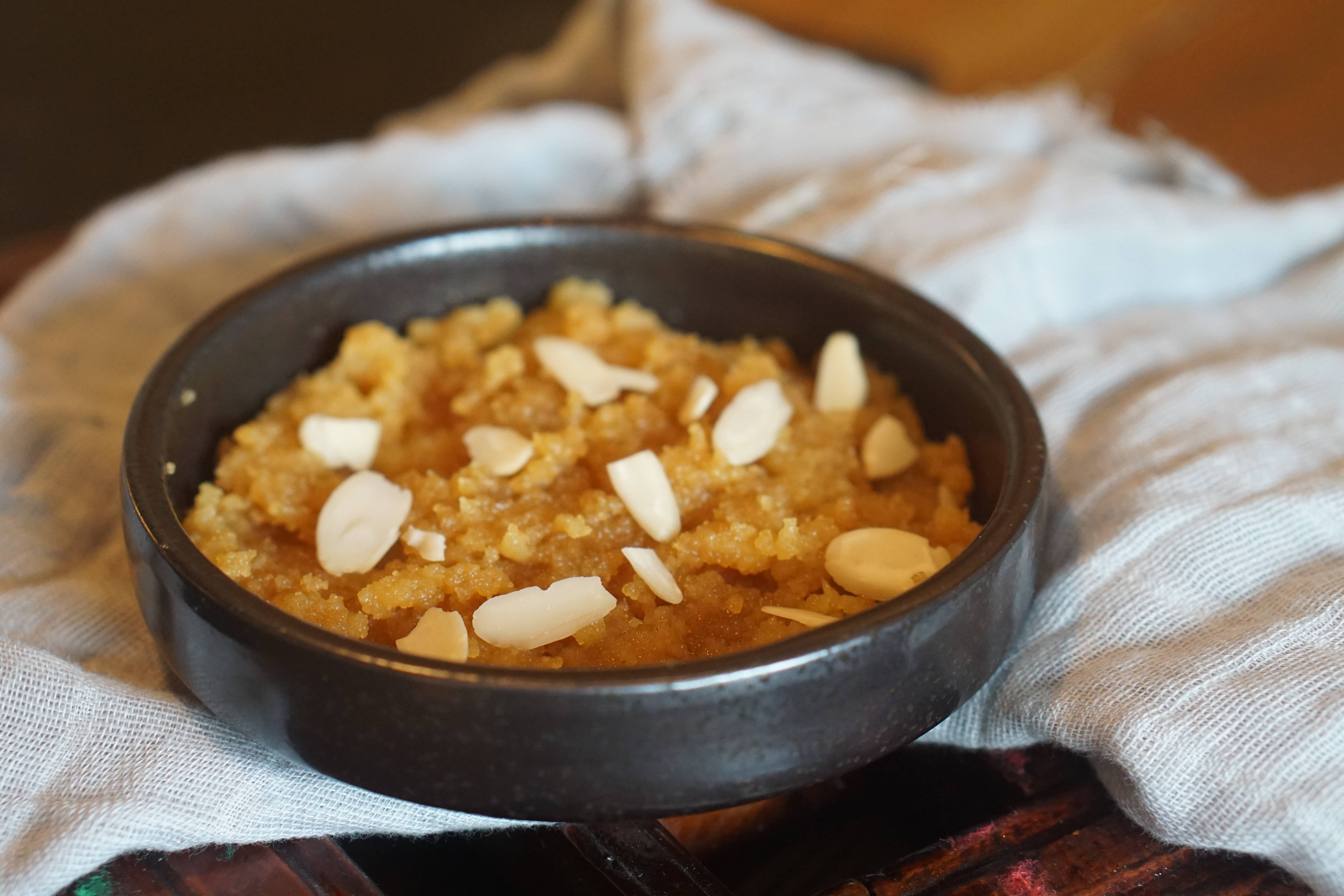 Order Moong Daal Halwa food online from Wok Indian Kitchen store, Suwanee on bringmethat.com