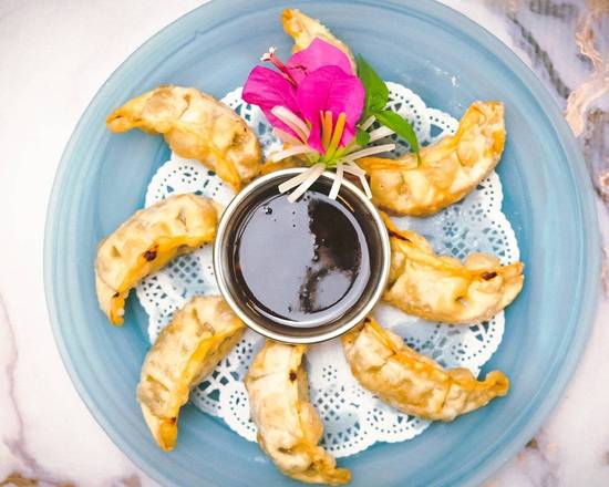 Order Veggie Dumplings (8 pcs) food online from Blue Orchid Thai Bistro store, Palm Desert on bringmethat.com