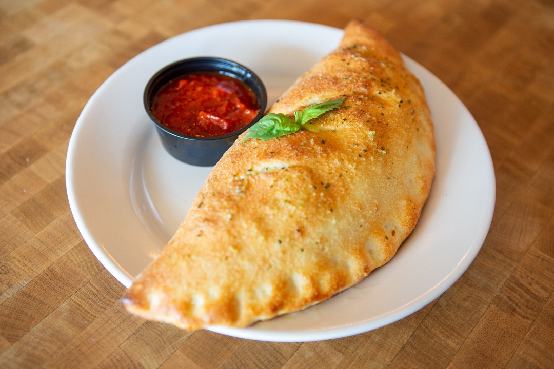 Order Cheese Calzone food online from Antonio's House of Pizza store, Orlando on bringmethat.com