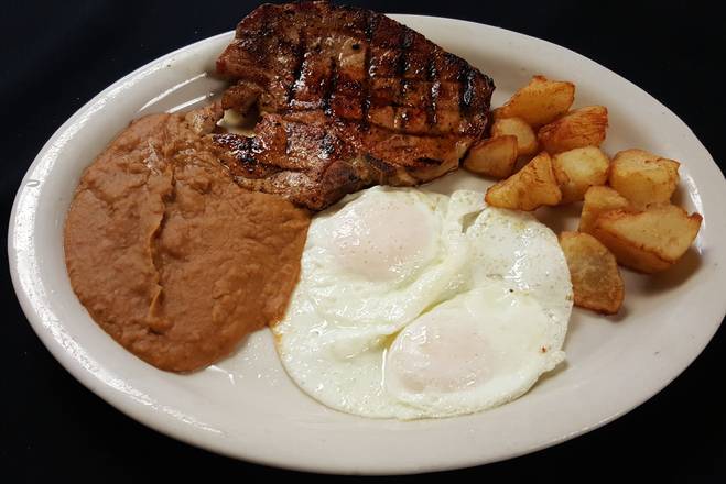 Order Pork Chop and Eggs food online from Los Charros Mexican Grill store, Houston on bringmethat.com