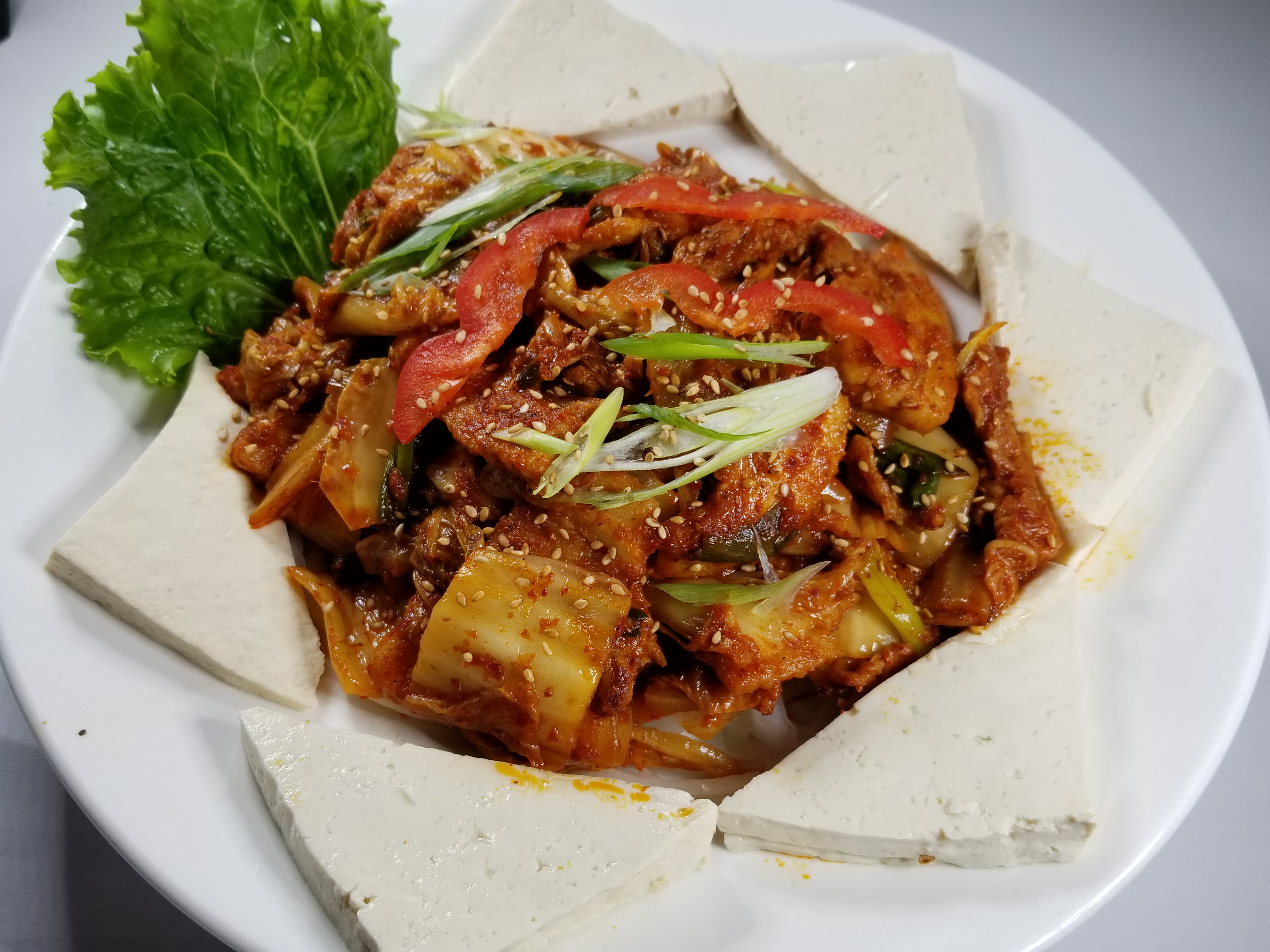 Order Stir Fried Kimchi with Pork and Tofu food online from Fusion Izakaya 52 store, San Diego on bringmethat.com
