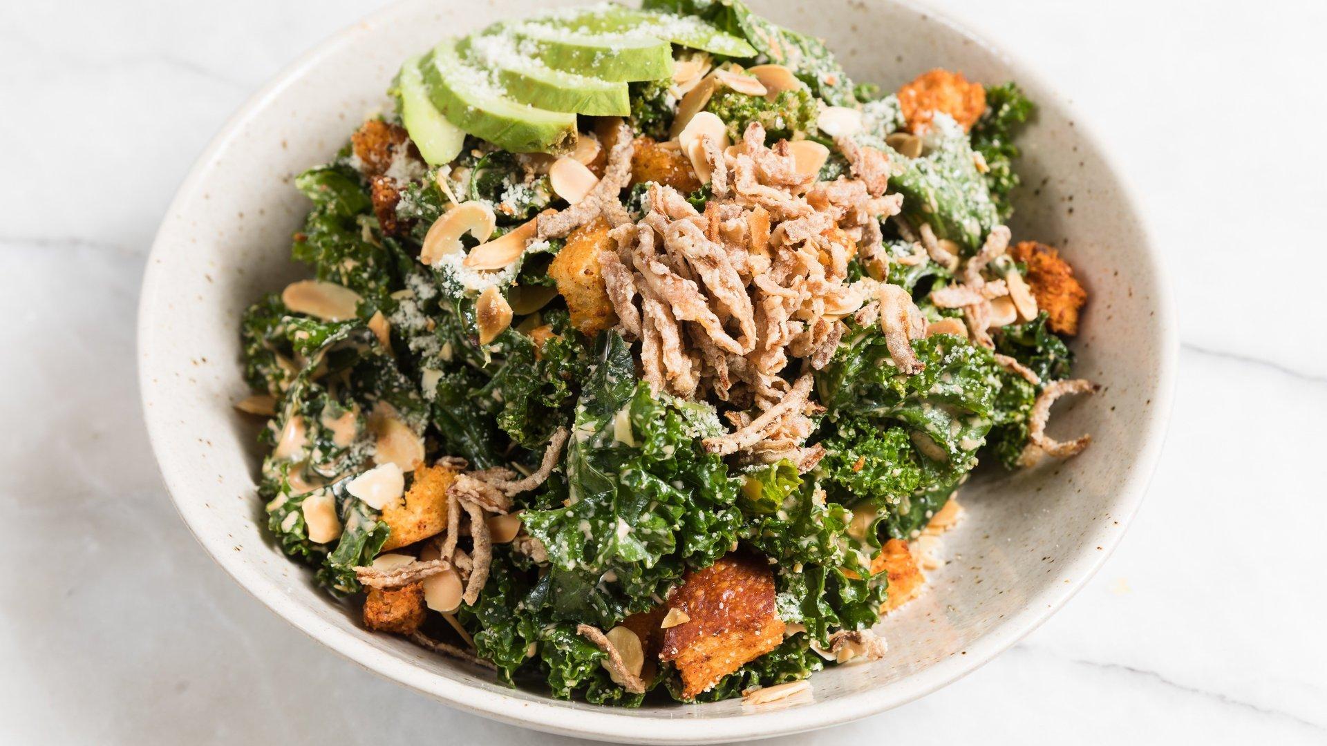 Order Spicy Kale Caesar Salad food online from The Butcher's Daughter store, New York on bringmethat.com